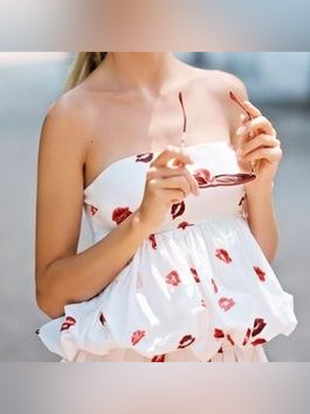 Anthropologie White strapless bubble peplum top with Red Lip Print